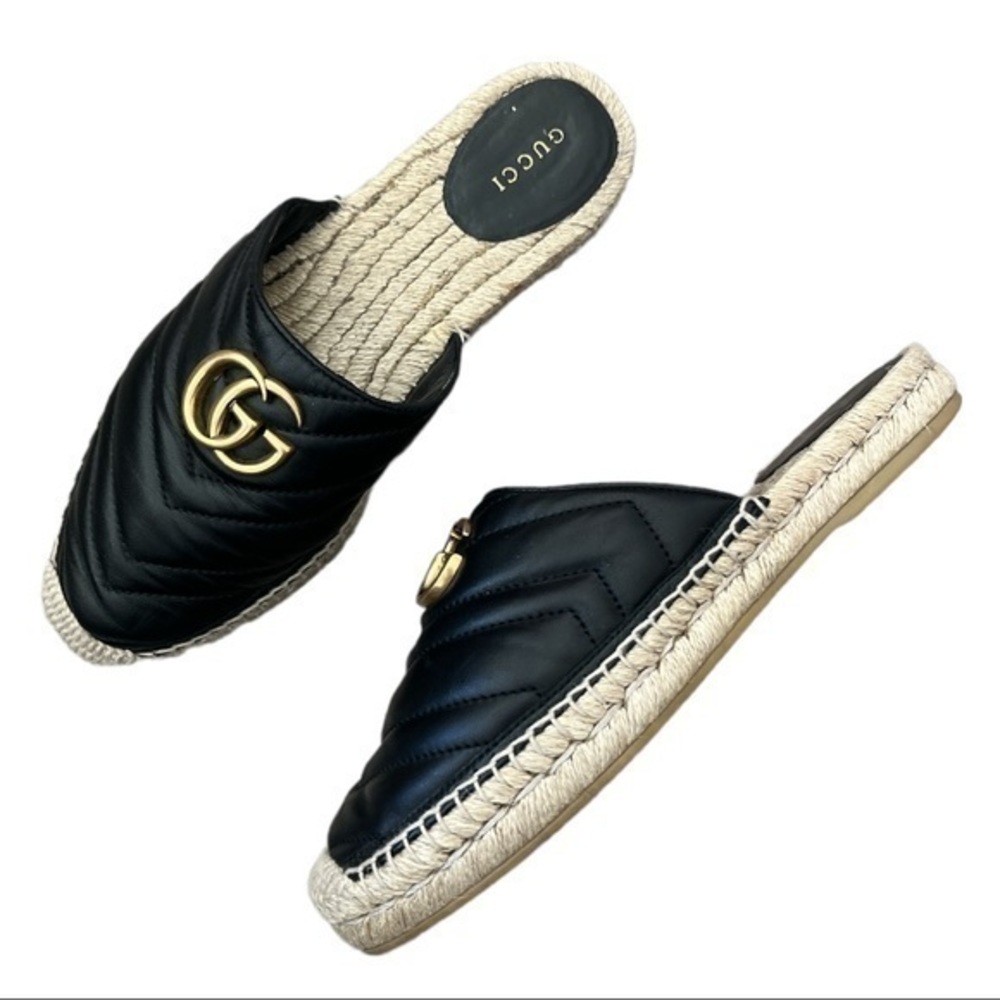 Gucci Black Mules with Gold Logo
